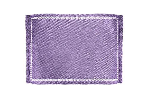 Чистый Текстиль Фиолетовый Пластырь Одежды Этикетки Изолированы Над Белым — стоковое фото
