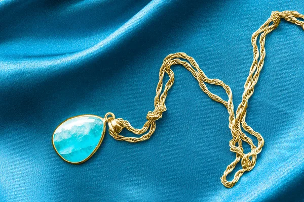 Elegant Gold Necklace Aquamarine Pendant Blue Satin Background — Stock Photo, Image