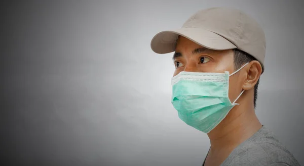 Close Young Male Wearing Protective Face Mask Dark Background — Stock Photo, Image