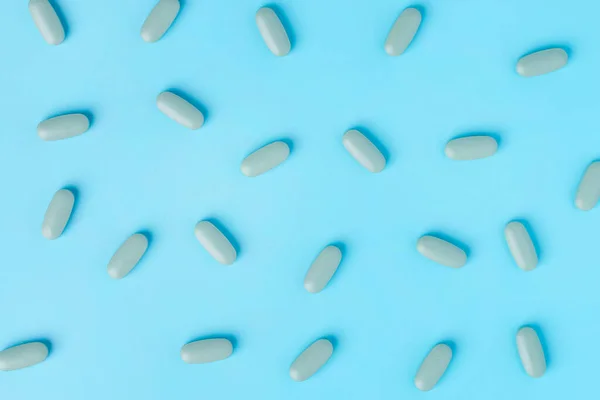 Pastillas Médicas Sobre Fondo Azul Vista Superior Con Espacio Copia —  Fotos de Stock