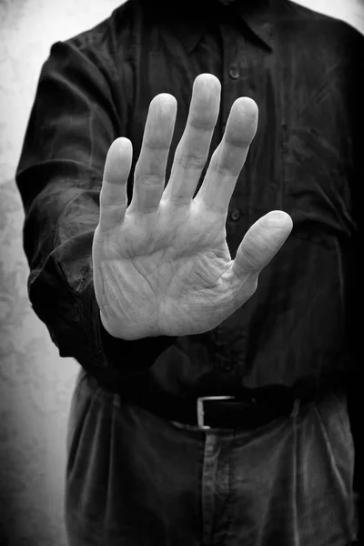 Человек с открытой рукой, чтобы сказать остановить коррупцию — стоковое фото