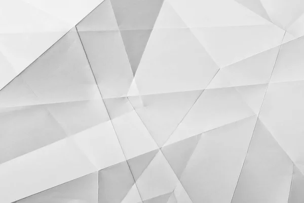 白い折られた用紙 枚軽放牧下での抽象的な模様を示します 背景として使用する良い — ストック写真