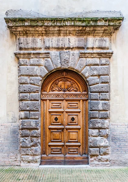 Detalhe da porta do Palácio Ducale na cidade de Urbino, Marche, Itália — Fotografia de Stock