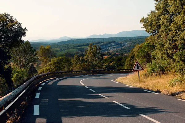 Curved bend on country road — Stock Photo, Image