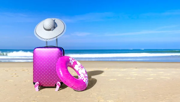 Suitcase with sun hat and rubber ring on sea beach.