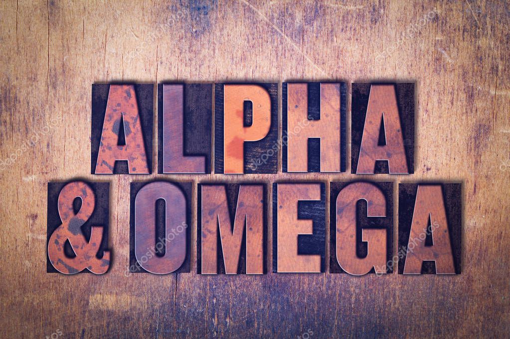 The words Alpha and Omega concept and theme written in vintage wooden letterpress type on a grunge background.