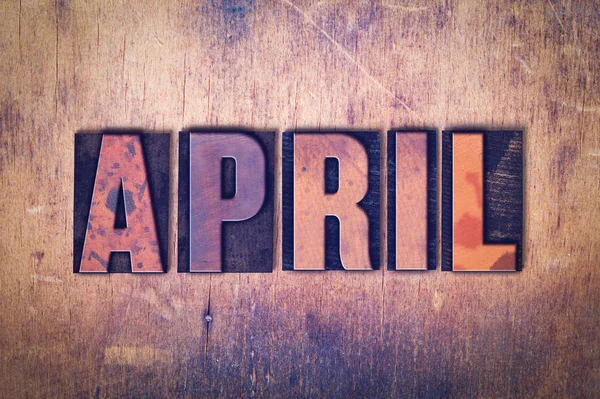 April Theme Letterpress Word on Wood Background — Stock Photo, Image