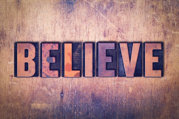 Believe Theme Letterpress Word on Wood Background — Stock Photo, Image