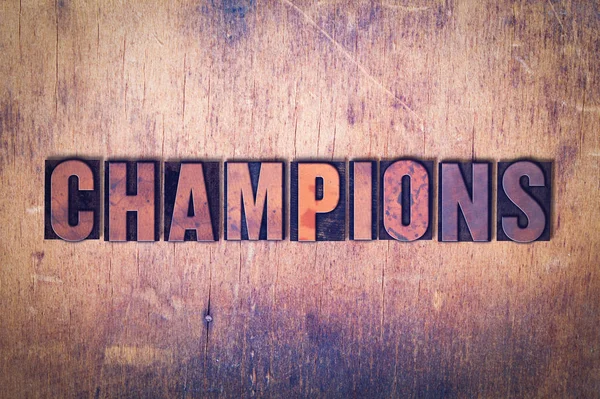Champions Thème Letterpress Word sur fond bois — Photo