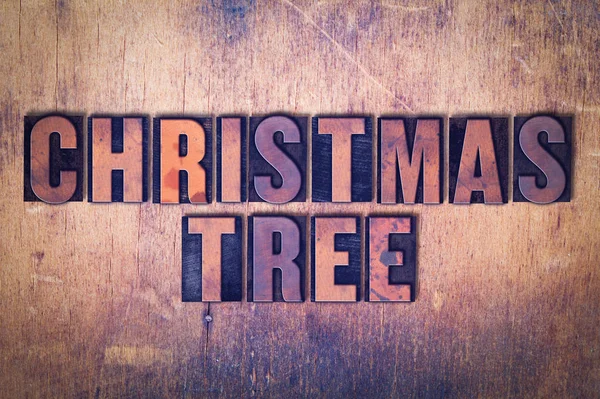 Christmas Tree Theme Letterpress Word on Wood Background — Stock Photo, Image