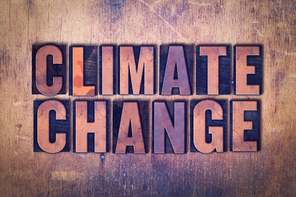 Mudança climática tema Letterpress Palavra sobre fundo de madeira — Fotografia de Stock