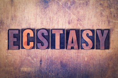 Ecstasy Tema Letterpress Word ahşap arka plan üzerinde
