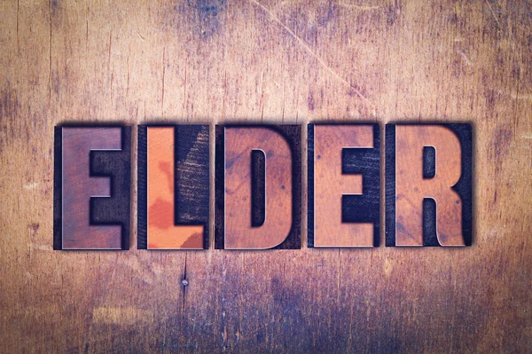 Elder Theme Letterpress Word on Wood Background — Fotografie, imagine de stoc