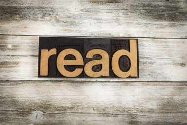 Ahşap arka plan üzerinde Letterpress kelime oku