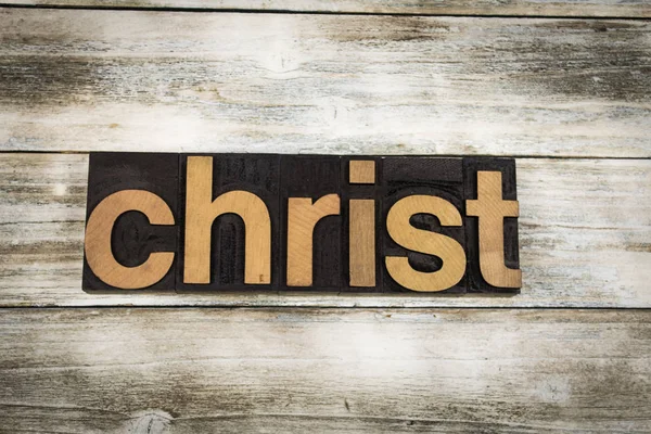 Christus boekdruk Word op houten achtergrond — Stockfoto
