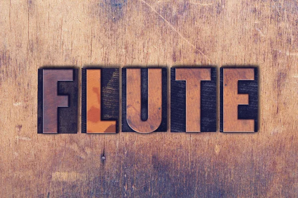 Flauta Tema Letterpress Palavra sobre fundo de madeira — Fotografia de Stock