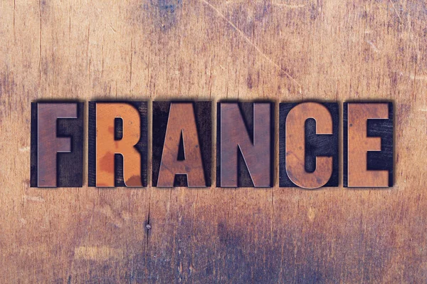 Francia Tema Letterpress Word su sfondo legno — Foto Stock