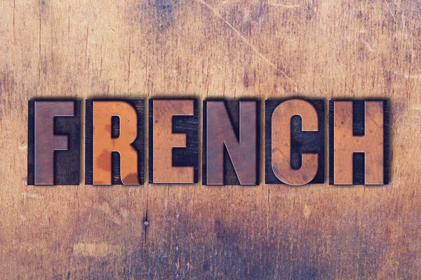 Francês Tema Letterpress Palavra sobre fundo de madeira — Fotografia de Stock