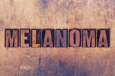 Melanom Tema Letterpress Word ahşap arka plan üzerinde