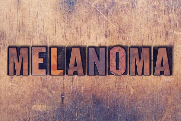 Melanom Tema Letterpress Word ahşap arka plan üzerinde