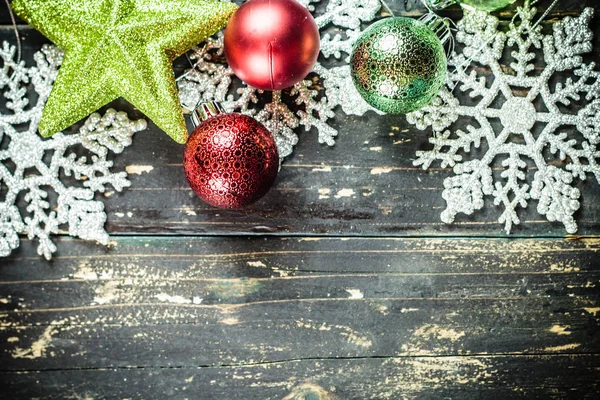 Christmas Holiday Ornaments on a Dark Wood Background. — Stock Photo, Image
