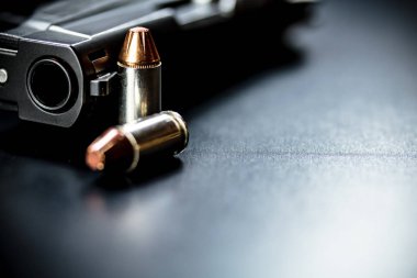 Pistol Handgun and Bullets clipart