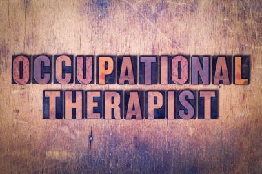 Mesleki terapist Tema Letterpress Word ahşap arka plan üzerinde