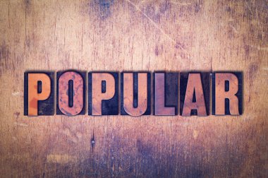 Popüler Tema Letterpress Word ahşap arka plan üzerinde