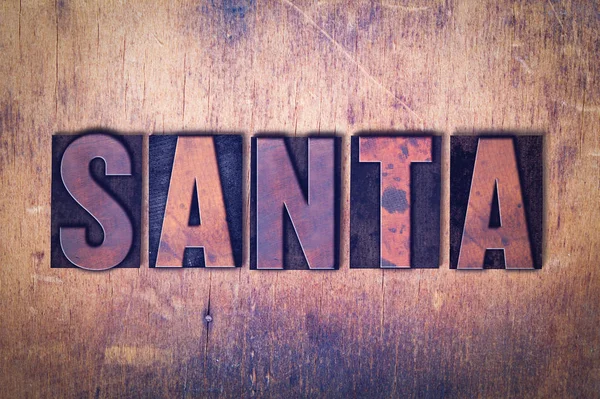 Santa Theme Letterpress Слово на фоні дерева — стокове фото