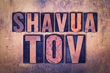 Shavua Tov Tema Letterpress Word ahşap arka plan üzerinde