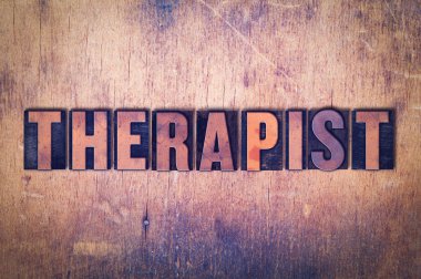 Terapist Tema Letterpress Word ahşap arka plan üzerinde