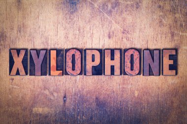 Ksilofon Tema Letterpress Word ahşap arka plan üzerinde