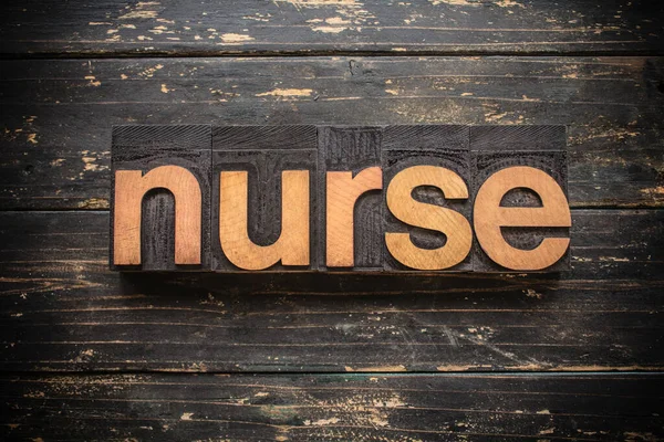 Word Nurse Written Vintage Wood Letterpress Type Vintage Rustic Background — Stock Photo, Image