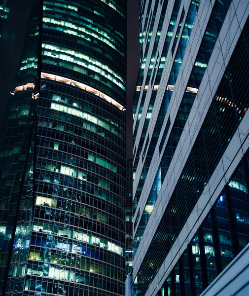 Skyscrapers at night, abstract background. Financial center
