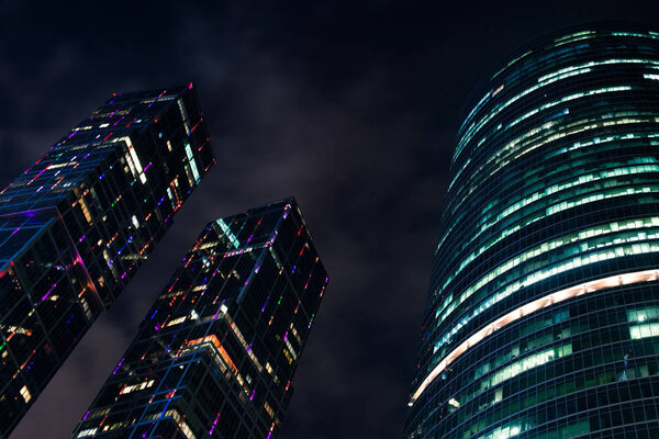 Skyscrapers in Moscow, city, financial center at night. Cityscape