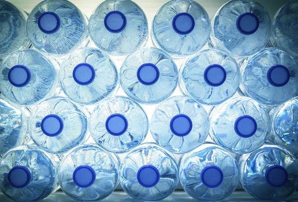 Rows of water in plastic bottles