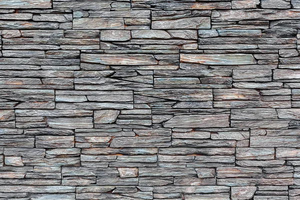 Graue Steinmauer als Hintergrund — Stockfoto