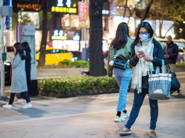 Passengers wearing face mask in street in Taipei,Taiwan.