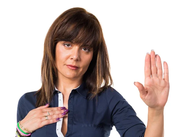 Bonita mujer haciendo juramento —  Fotos de Stock