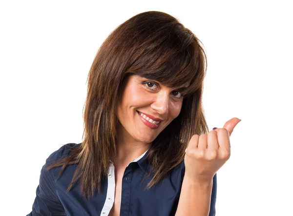 Pretty woman doing a money gesture — Stock Photo, Image