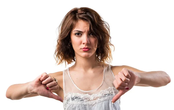 Mujer haciendo mala señal — Foto de Stock