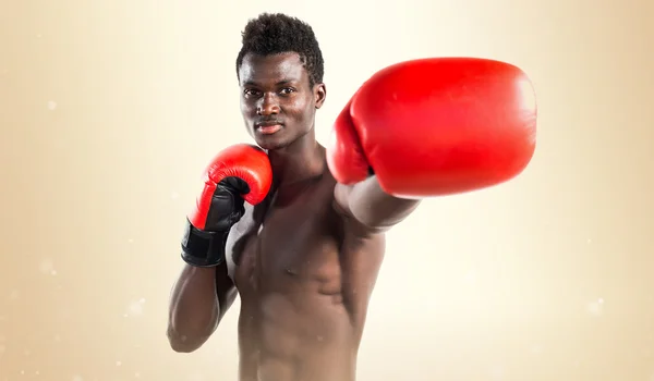 Handsome black man with boxing gloves