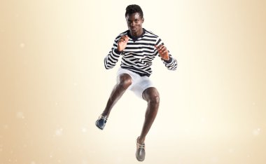 Atlama yakışıklı zenci