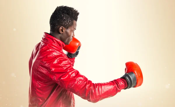 Black man with boxing gloves