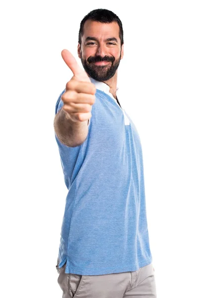 Hombre con camisa azul con pulgar hacia arriba — Foto de Stock