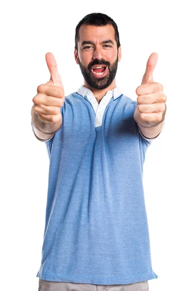 Hombre con camisa azul con pulgar hacia arriba —  Fotos de Stock