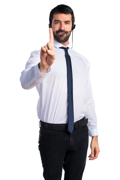 Joven con auriculares contando uno — Foto de Stock