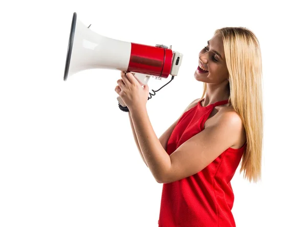 Menina loira gritando por megafone — Fotografia de Stock