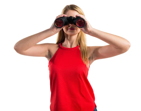 Blonde girl with binoculars — Stock Photo, Image