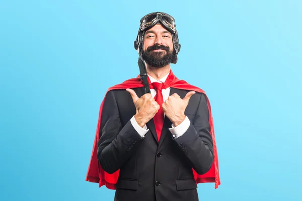 Super hero businessman with thumb up — Stock Photo, Image